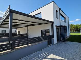 Lichtdurchflutete Doppelhaushälfte - Erstbezug mit Garten, Balkon und Carport, 460000 €, Immobilien-Häuser in 2440 Gemeinde Gramatneusiedl