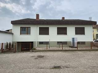 vollunterkellerter Familienbungalow, beispielsweise für die Familie mit zwei Kindern