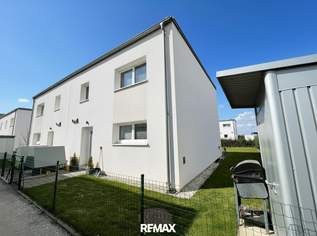 Traumhaftes Wohngefühl - top ausgestattetes Haus mit gemütlicher Terrasse, Garten und 2 Autoabstellplätzen!, 407000 €, Immobilien-Häuser in 2604 Theresienfeld
