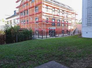 Neubauwohnung in Zentrumslage mit großer Balkon-Loggia und Carport