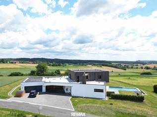 Architektenhaus in sonniger Ruhelage mit Spiral-Weinkeller, Infinity Pool, Burgblick und ca. 1 ha Eigengrund, 959000 €, Immobilien-Häuser in 7542 Gerersdorf bei Güssing