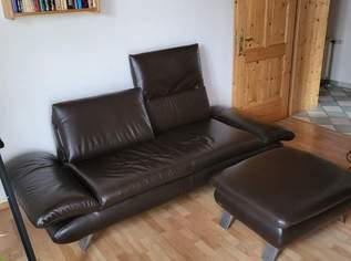 Ledersofa mit Hocker