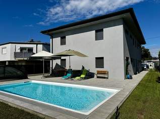 Energieeffizienter Neubau mit Pool und Smart-Home-Technologie, 0 €, Immobilien-Häuser in 9020 