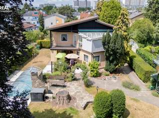 Einfamilienhaus mit Salzwasserpool, Wintergarten, Garage und zwei Carports, 1539000 €, Immobilien-Häuser in 1230 Liesing