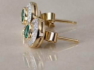 Smaragd mit Brillanten in 750er Gelbgold Smaragd mit Brillanten in 750er Gelbgold