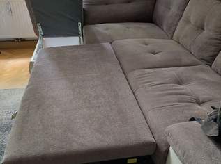 Couch mit weißen Leder und Bettfunktion 