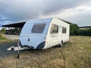 Knaus Südwind 550 FSK mit Stockbetten, Rundsitzgruppe und Festbett Knaus Südwind 550 FSK mit Stockbetten, Rundsitzgruppe und Festbett