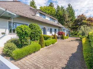 Einzigartige Liegenschaft mit Kachelofen, Wintergarten und parkähnlichen Grundstück in Toplage, 850000 €, Immobilien-Häuser in 9020 