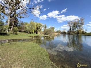 BAUGRUNDSTÜCK IN EINZIGARTIGER LAGE DIREKT AM MÜHLWASSER - NÄHE DONAUSPITAL, 410000 €, Immobilien-Grund und Boden in 1220 Donaustadt