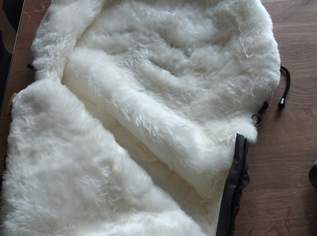 Lammfellsack mit Reinigungsmittel Lammfellsack mit Reinigungsmittel
