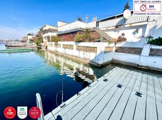 Donau-Juwel direkt am Wasser mit privatem Boots­anlegeplatz, 3499000 €, Immobilien-Häuser in 1220 Donaustadt