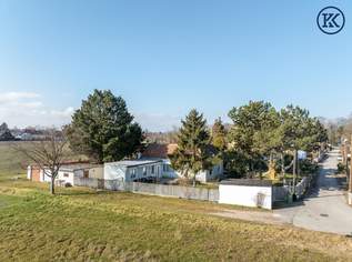 Charmanter Bungalow mit Weitblick – großes Eckgrundstück & viel Gestaltungsspielraum, 1200000 €, Immobilien-Häuser in 1220 Donaustadt