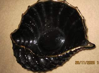 Vergoldete Muschelschale.