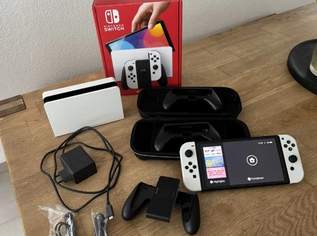Nintendo Switch OLED-Modell HEG-001 64GB Handheld-Spielekonsole - Weiß, 90 €, Marktplatz-Kameras & TV & Multimedia in 1060 Mariahilf