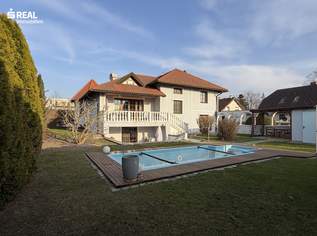 Stilvolles Einfamilienhaus mit Keller, Pool und traumhaftem Garten – Wohnen in ruhiger Lage nahe Wien, 695000 €, Immobilien-Häuser in 2401 Gemeinde Fischamend