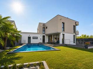 Exklusives Einfamilienhaus mit Pool, Doppelgarage & hochwertiger Ausstattung, 0 €, Immobilien-Häuser in 2475 Neudorf