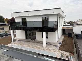 Neu gebautes Haus mit Pool und Doppelgarage, 895000 €, Immobilien-Häuser in 4614 Marchtrenk