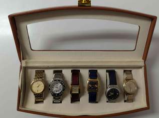 Konvolut Armbanduhren in Schatulle - Centia, Swatch, Zenith, Fossil Konvolut Armbanduhren in Schatulle - Centia, Swatch, Zenith, Fossil