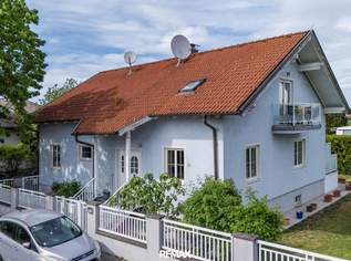 "Wohnkomfort auf mehreren Ebenen - mit großem Garten & Garage", 649000 €, Immobilien-Häuser in 2483 Katastralgemeinde Weigelsdorf