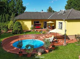 Licht, Luft und Freiheit: Bungalow mit großem Garten und Pool, 595000 €, Immobilien-Häuser in 2231 Strasshof an der Nordbahn